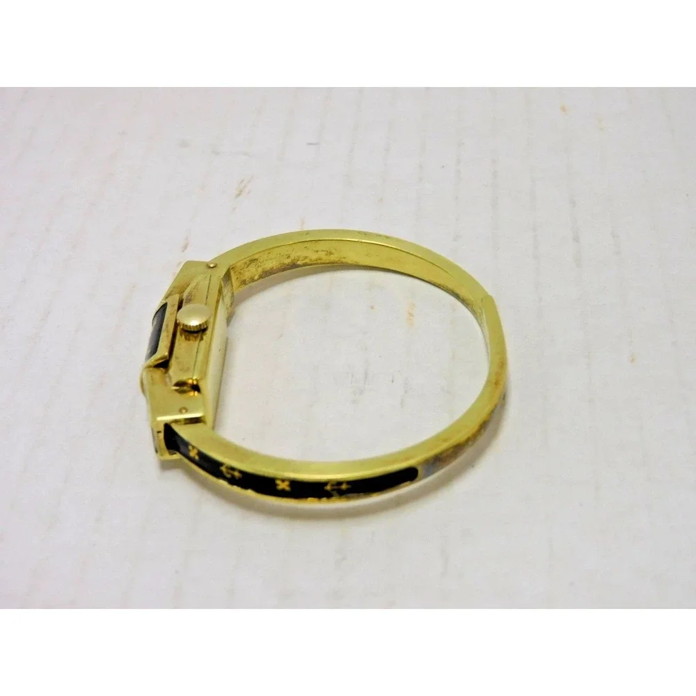 Vtg Swiss Hidden Face Watch Bangle Bracelet Black Enamel Gold Tone JC245